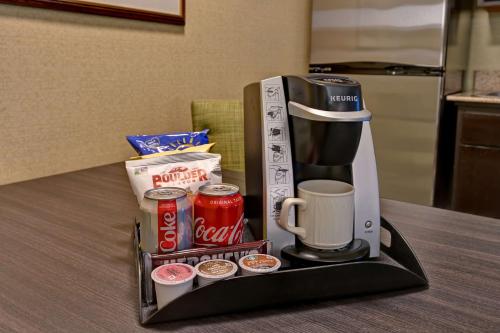 a coffee maker sitting on top of a table at Homewood Suites by Hilton Boulder in Boulder