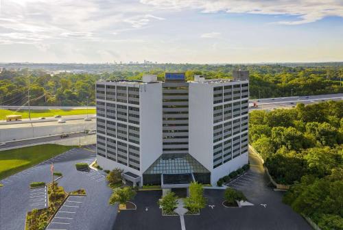 an overhead view of a tall white building at Hilton Nashville Airport in Nashville