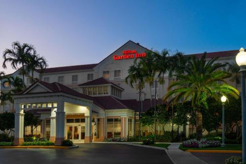 a hotel with a sign on the top of it at Hilton Garden Inn Ft. Lauderdale SW/Miramar in Miramar