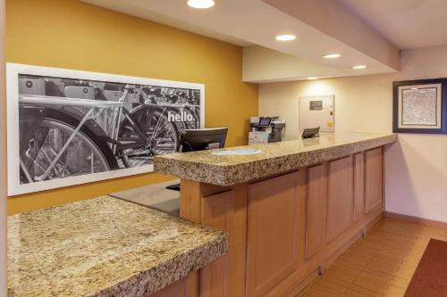 an office with a picture of a motorcycle on the wall at Hampton Inn Minneapolis-Burnsville in Burnsville
