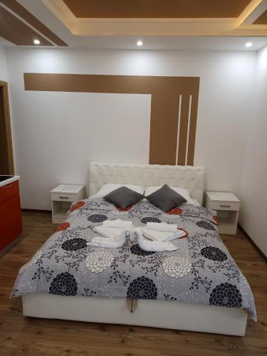 Postel nebo postele na pokoji v ubytování Apartmani Slađo