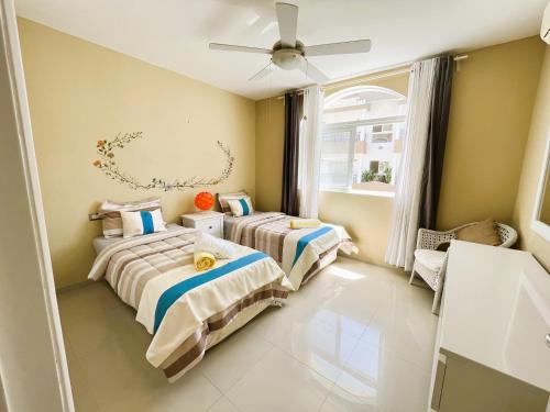Postel nebo postele na pokoji v ubytování Beauty Orquidea 2bed apartment in El Cortecito Playa Bavaro