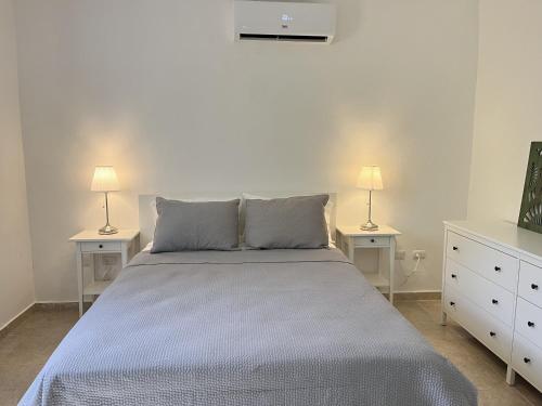 Postel nebo postele na pokoji v ubytování Beauty 1 bed ground flor apartment walking distance Playa Bavaro