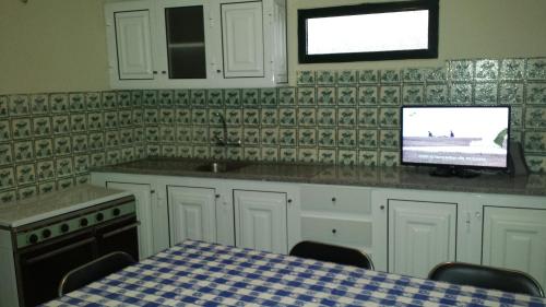 Kuchyň nebo kuchyňský kout v ubytování Casa do Pico