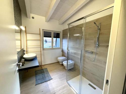 Et badeværelse på Appartamento Ginepro