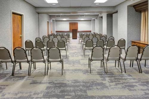 a room with rows of chairs and a podium at Homewood Suites by Hilton Richmond - West End / Innsbrook in Broad Meadows