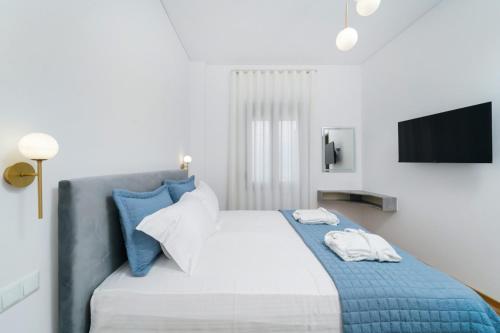 Postel nebo postele na pokoji v ubytování Artio Maisonette