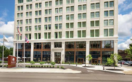 a large white building with many windows at Doubletree By Hilton Youngstown Downtown in Youngstown