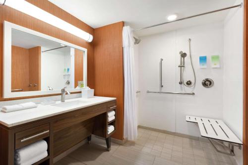 a bathroom with a sink and a shower at Home2 Suites by Hilton Grovetown Augusta Area in Augusta