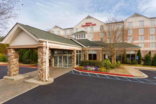 una representación de la parte delantera de un hotel en Hilton Garden Inn Atlanta Northpoint en Alpharetta