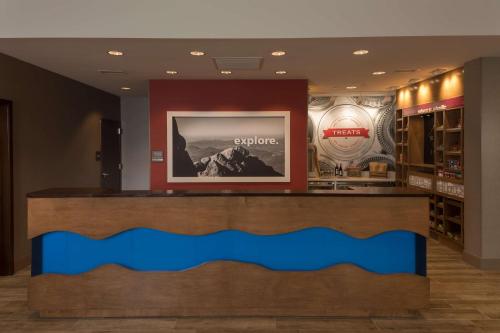 a store front with a blue counter in a store at Hampton Inn & Suites-Asheville Biltmore Village, NC in Asheville