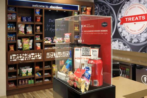 a store with a shelf of food in a store at Hampton Inn & Suites By Hilton Baltimore/Aberdeen, Md in Aberdeen