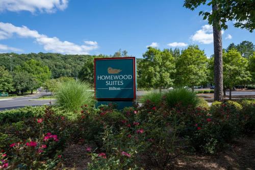 a sign for the homewood suites milwaukee at Homewood Suites by Hilton Birmingham-SW-Riverchase-Galleria in Hoover
