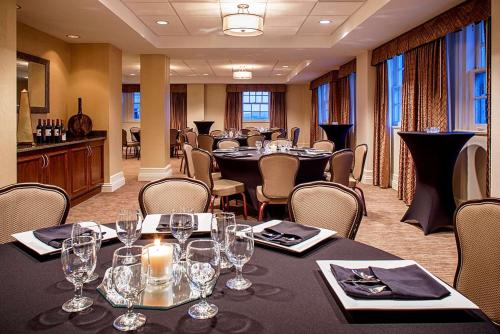 a conference room with tables and chairs with wine glasses at Hampton Inn & Suites Birmingham-Downtown-Tutwiler in Birmingham
