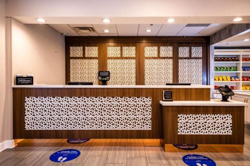 a lobby of a store with a counter and a counter top at Homewood Suites by Hilton Birmingham-SW-Riverchase-Galleria in Hoover