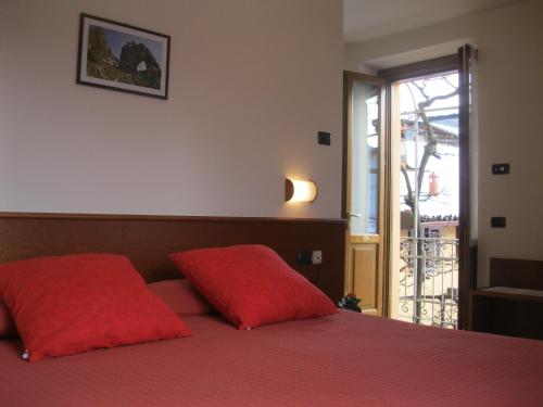 Postel nebo postele na pokoji v ubytování Albergo Esposito