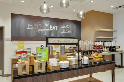 a bakery counter with boxes of food on it at Hampton Inn & Suites by Hilton Nashville North Skyline in Nashville