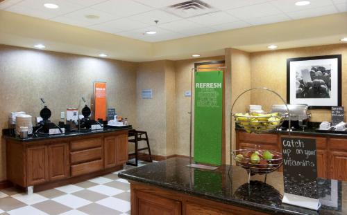 a waiting room at a hospital with a checkout counter at Hampton Inn and Suites-Brownsville in Brownsville
