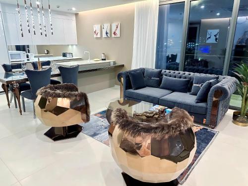 a living room with a couch and a table at Mullet Bay Suites - Your Luxury Stay Awaits in Cupecoy