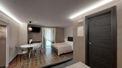 Postel nebo postele na pokoji v ubytování I 3 Principi, Garibaldi Suites