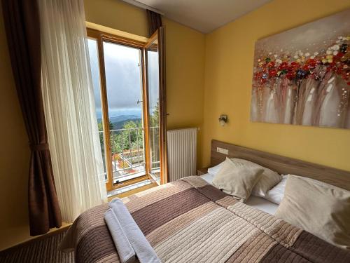 Postel nebo postele na pokoji v ubytování Hotel Zarja
