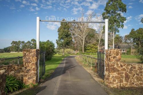 a gate with a sign that reads chattanooga park at Country Home Stay, Animals, 2 Properties Sleeps 15 in Balnarring