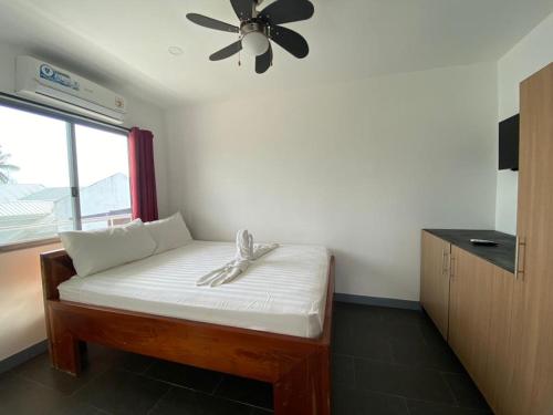 Ένα ή περισσότερα κρεβάτια σε δωμάτιο στο Malipaj Apartments