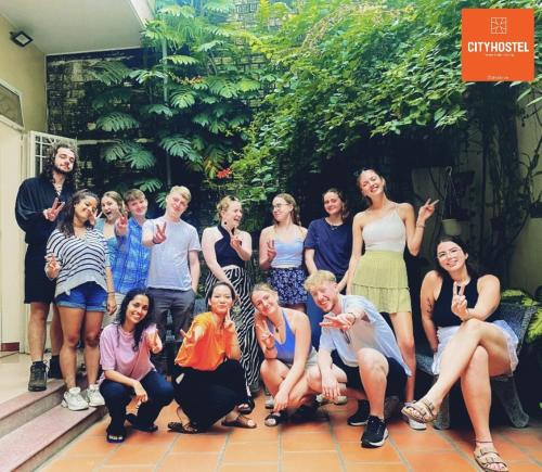 a group of people posing for a picture at City Hostel Da Nang in Danang