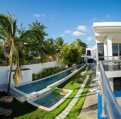 an image of a swimming pool at a resort at Posada Buena Vista Beach Club in El Yaque