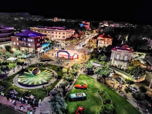 an aerial view of an amusement park at night at I love Pesaro in Pesaro