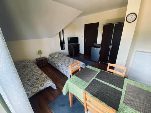 Katil atau katil-katil dalam bilik di Dom Letni Kopalino