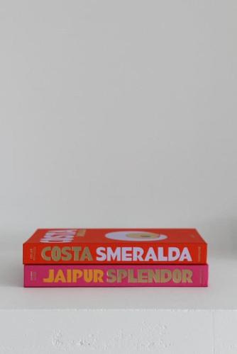 two books stacked on top of each other on a shelf at Mimizan Blue - Laid back luxury on the beach in Mimizan