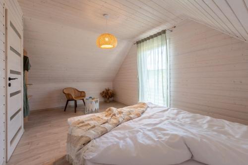 Postel nebo postele na pokoji v ubytování Natura Health Resort