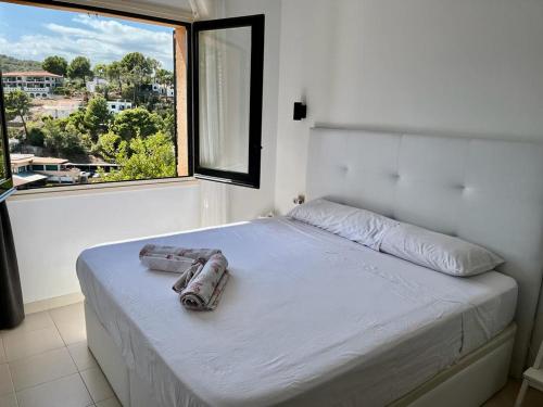 Postel nebo postele na pokoji v ubytování Casa ASIA. Relax a 5 minutos de las calas TOP.