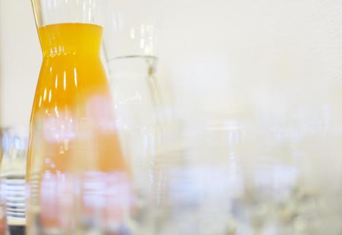 a group of glass vases sitting on a table at Pension zur Sonne in Illmitz