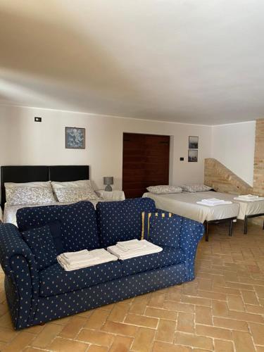 A bed or beds in a room at Rustico Althea - immerso nel verde