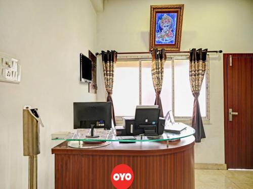 Et tv og/eller underholdning på OYO Flagship 81208 Laxmi Guest House Jadavpur