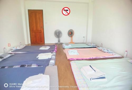 Postel nebo postele na pokoji v ubytování YYK Hostel 24H