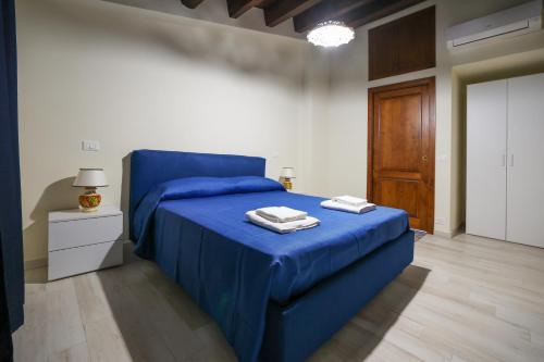 Ένα ή περισσότερα κρεβάτια σε δωμάτιο στο Agriturismo Case Rapputi