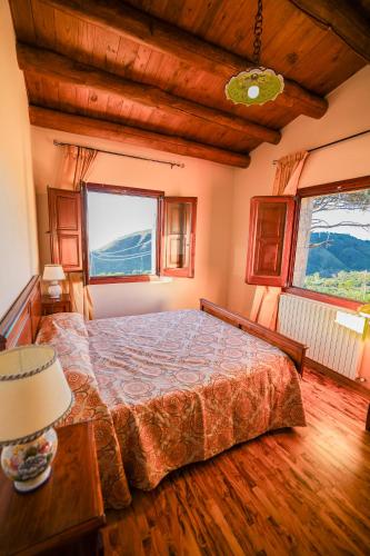 Ένα ή περισσότερα κρεβάτια σε δωμάτιο στο Agriturismo Case Rapputi
