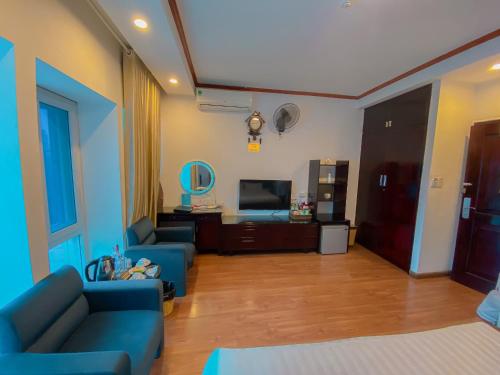 TV a/nebo společenská místnost v ubytování A25 Hotel - 61 Lương Ngọc Quyến