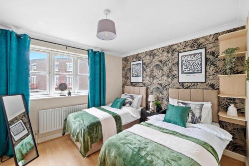 Krevet ili kreveti u jedinici u okviru objekta Stunning Central London 2 Bed Parking & Garden