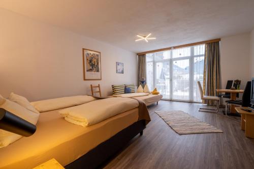 Ένα ή περισσότερα κρεβάτια σε δωμάτιο στο Ferienhaus Olympia