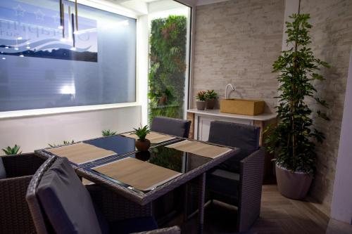 Coin salon dans l'établissement OPERAPRIMASUITE