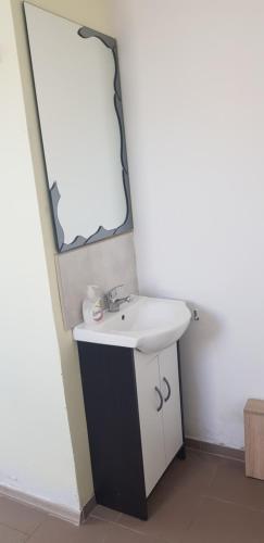 Ванна кімната в Noclegi Starogard