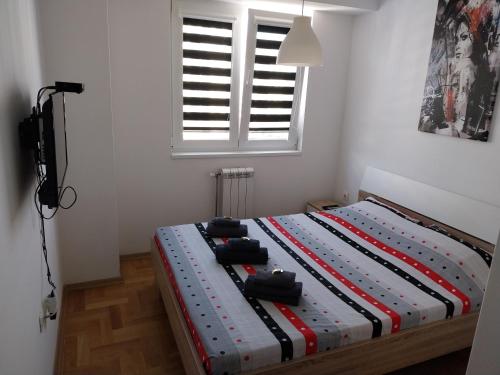 Postel nebo postele na pokoji v ubytování Bianco Rosso Apartment