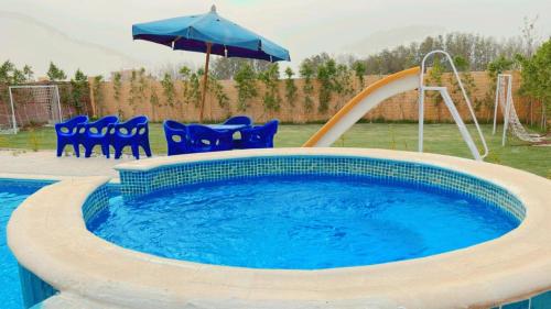 A piscina localizada em تيوليب فيلا ou nos arredores
