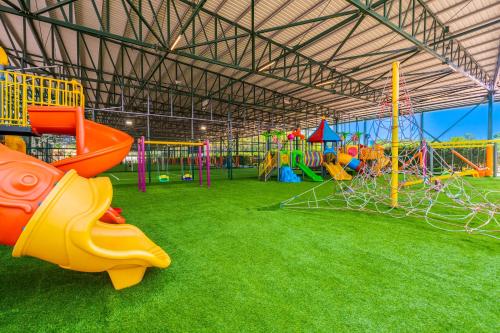 a playground with many different types of play equipment at Granada Luxury Belek - Family Kids Concept in Belek