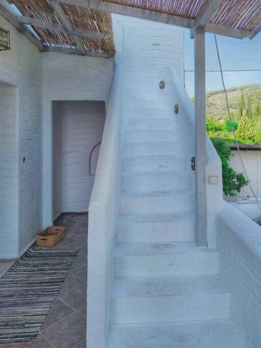 Φωτογραφία από το άλμπουμ του Island Home στον Πόρο
