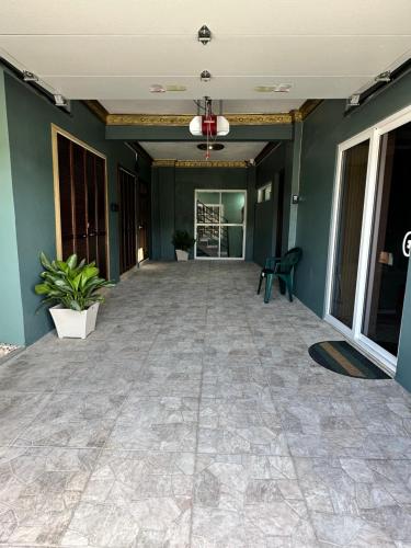 an empty room with a ceiling and green walls at Villa Panorama in Montego Bay